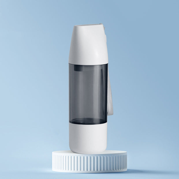 Portable water and food bottle for pets